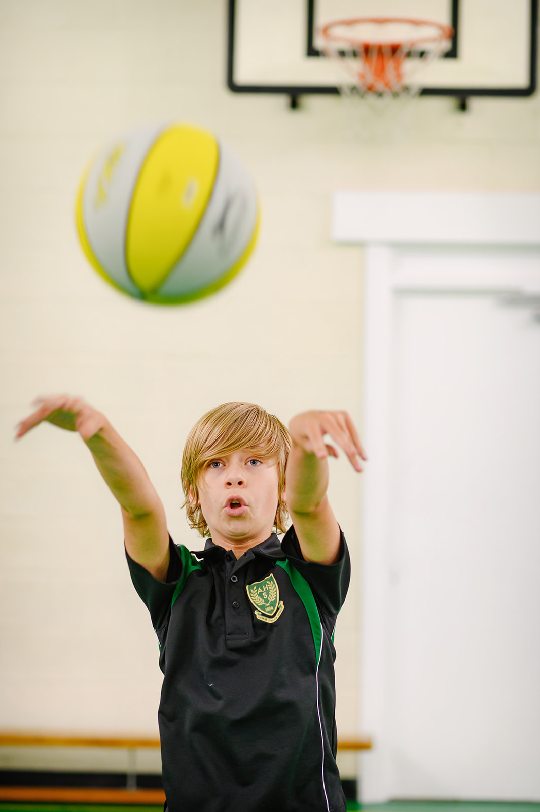 Young boy playing basketball